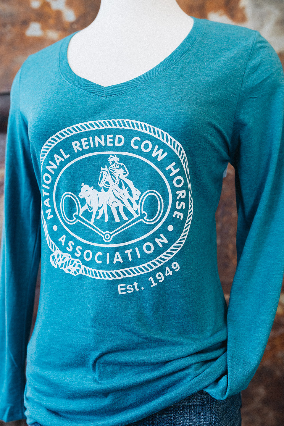Women's NRCHA Retro Logo Heather Teal Long Sleeve V-Neck Tee