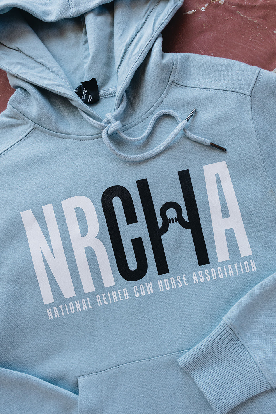 NRCHA Logo Women's Apricot and Blue Fog Hoodies